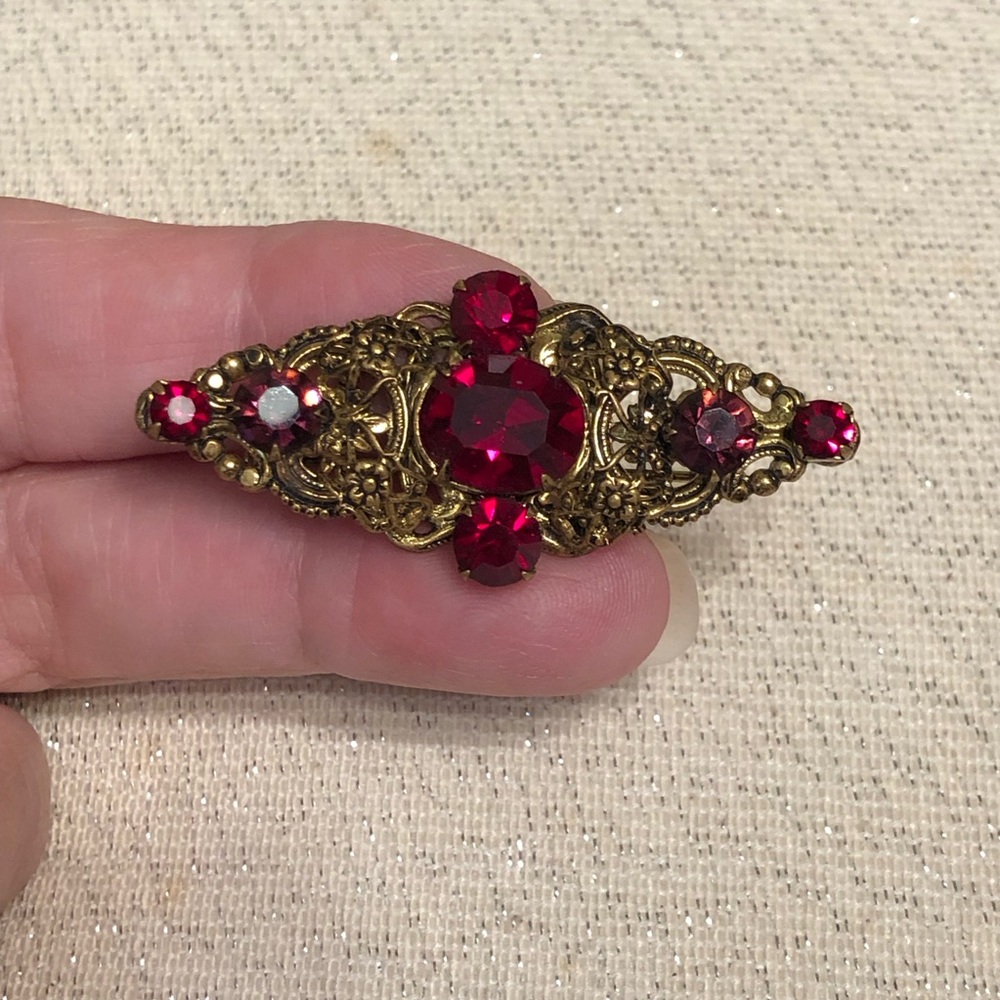 Vintage-Style Gold Tone Brooch with Deep Red Rhinestones